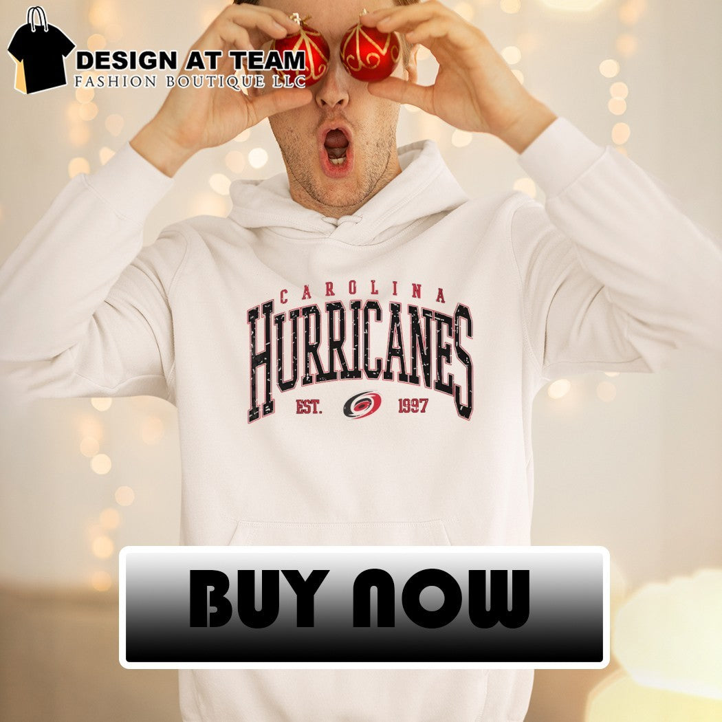 Carolina Hurricanes Ice hockey fan apparel featuring the text est 1997 shirt