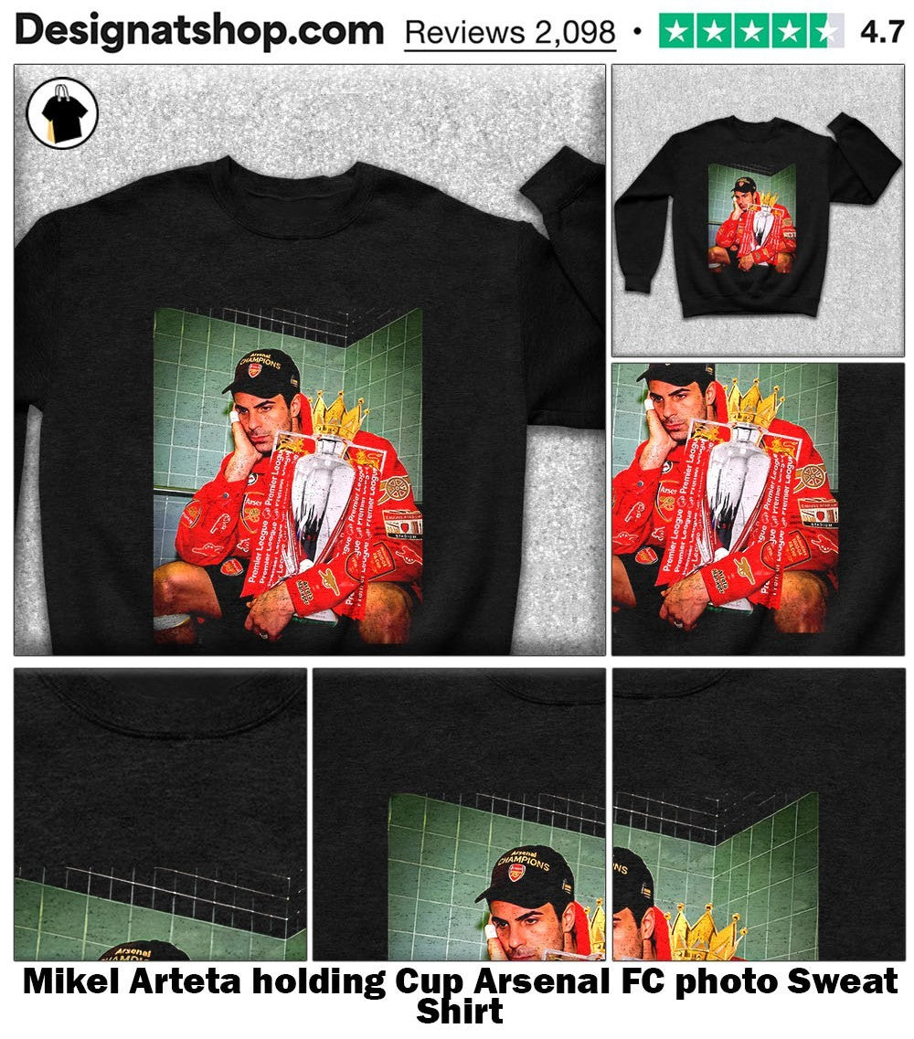 Mikel Arteta holding Cup Arsenal FC photo shirt