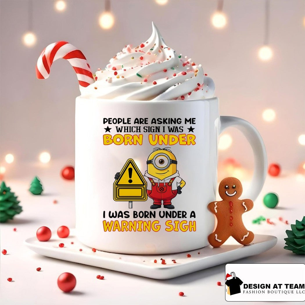 Minion people are asking me which sign I was born under I was born under a warning sign shirt