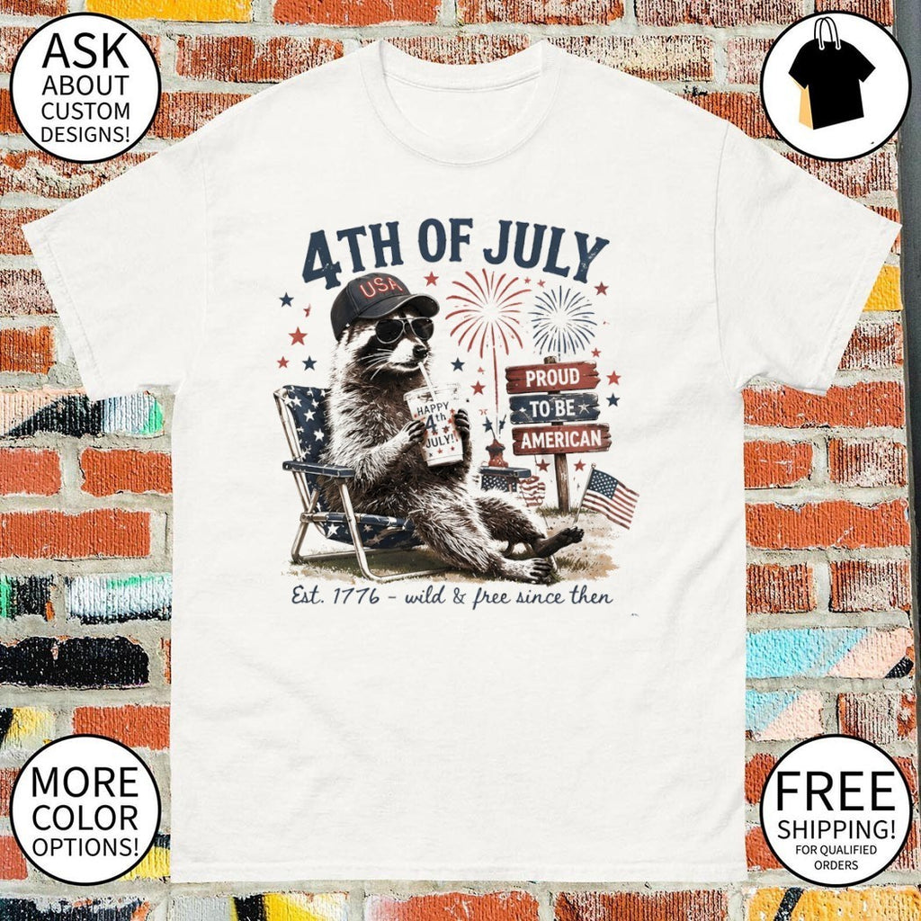 Raccoon in USA hat sunglasses drinking from cup 4th of July proud to be American shirt