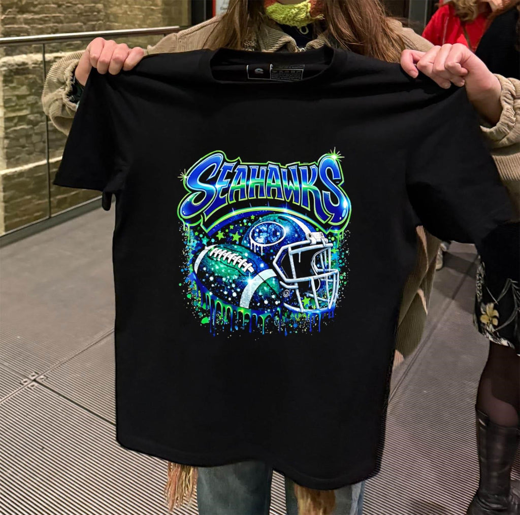 Seahawks Go Football Helmet and Ball Blue Green Drip Sparkle shirt