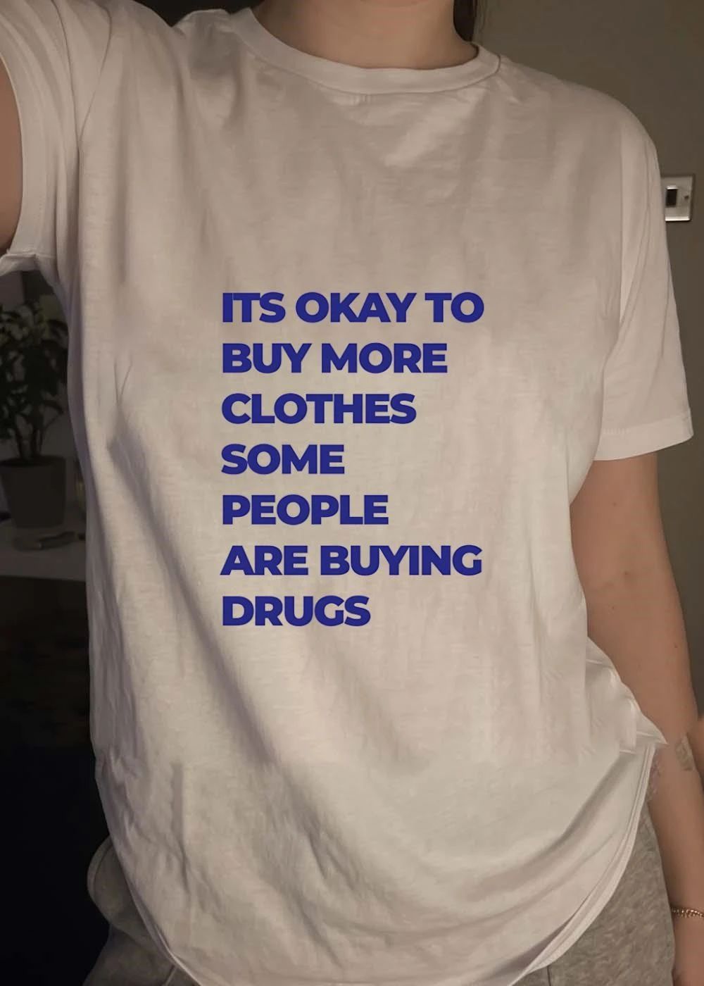 Fashion Statements It Is Okay to Buy More Clothes Some People Are Buying Drugs T-Shirt