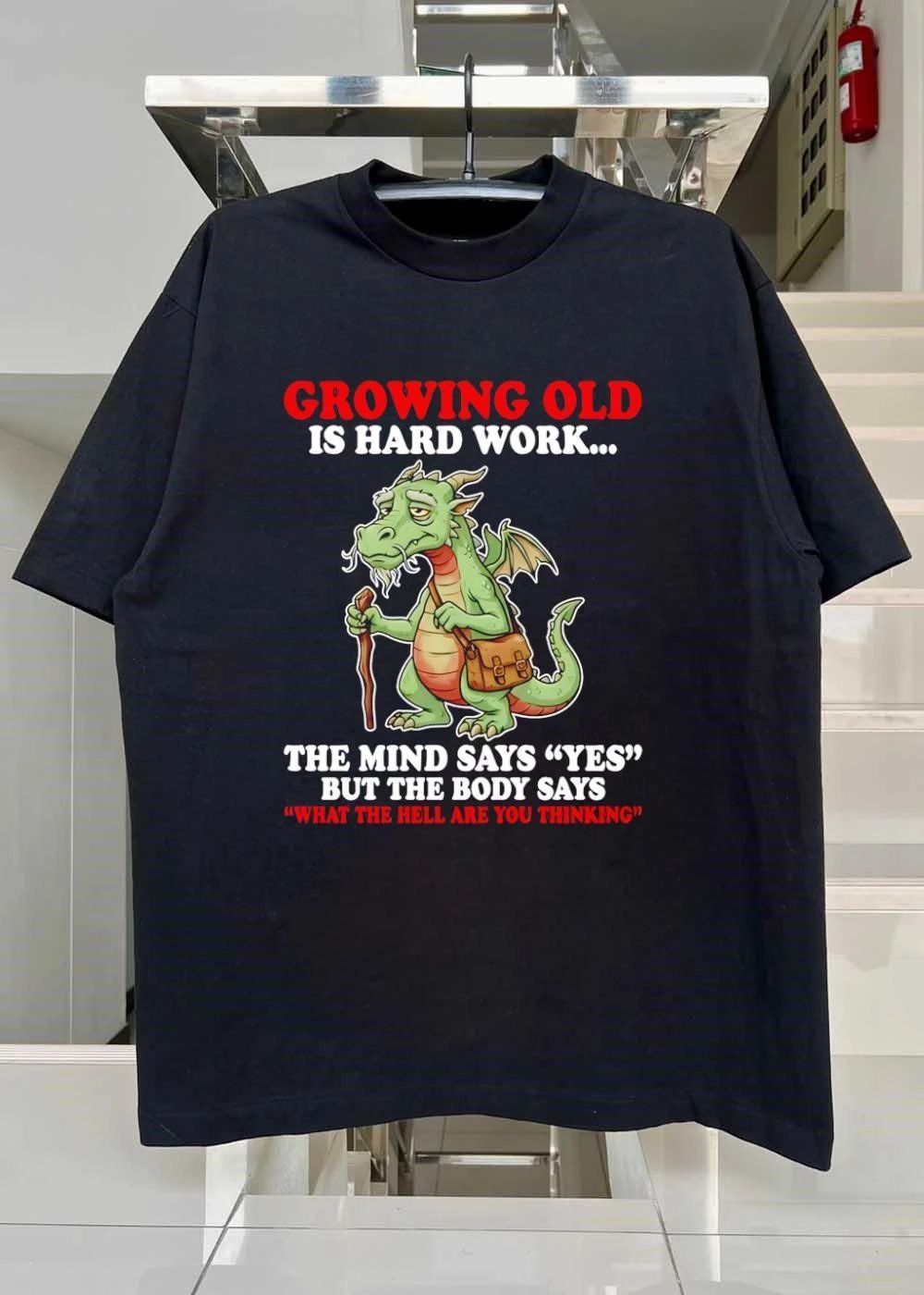 Growing Old Is Hard Work The Mind Says Yes But The Body Says What The Hell Are You Thinking Dragon T-Shirt