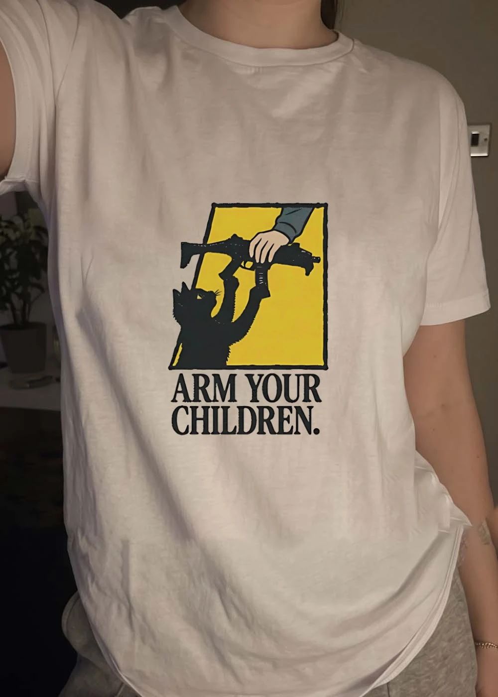 Arm Your Children Black Cat Holding A Gun shirt