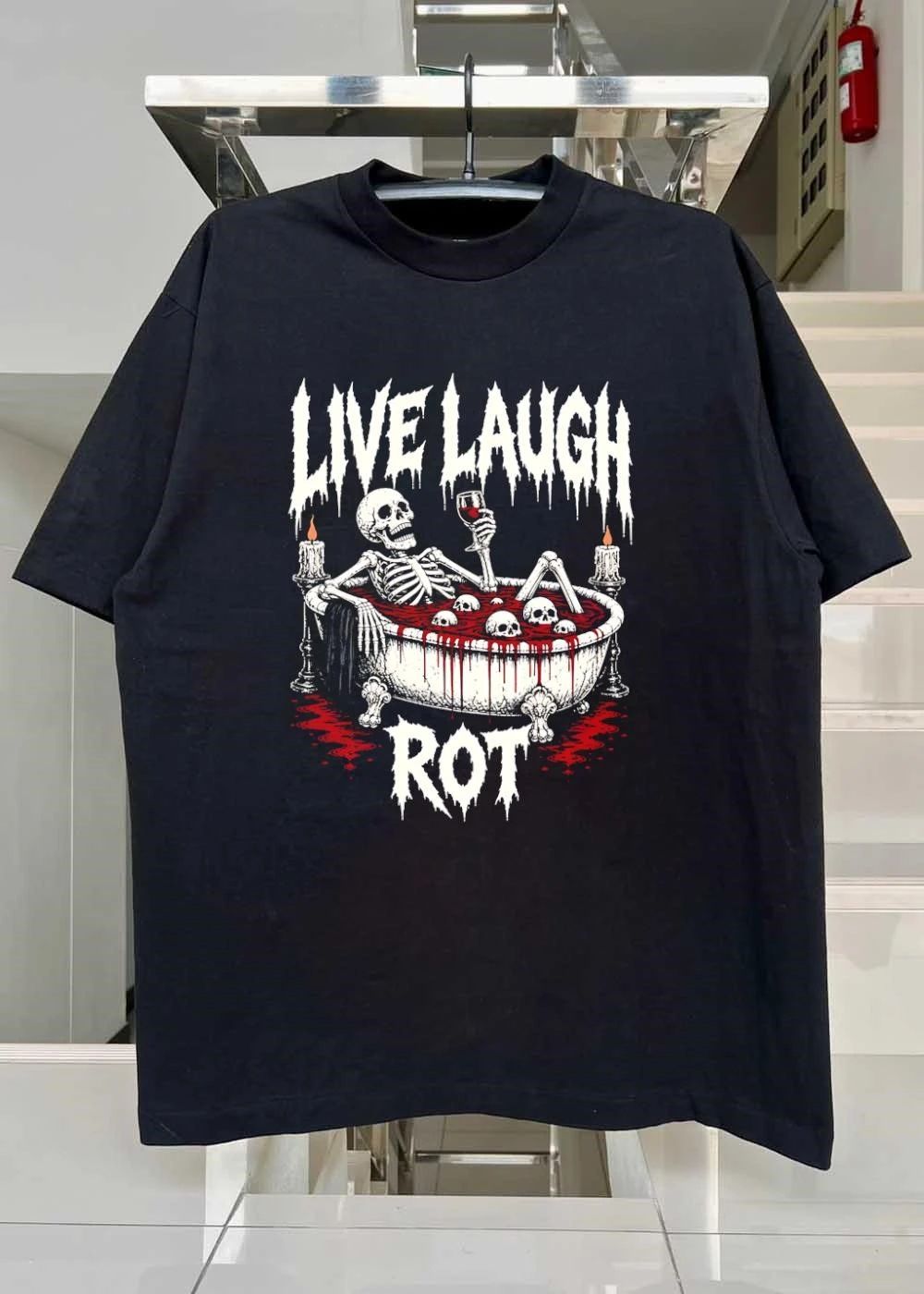 Skeleton in bathtub with blood and skulls holding wine glass live laugh rot shirt
