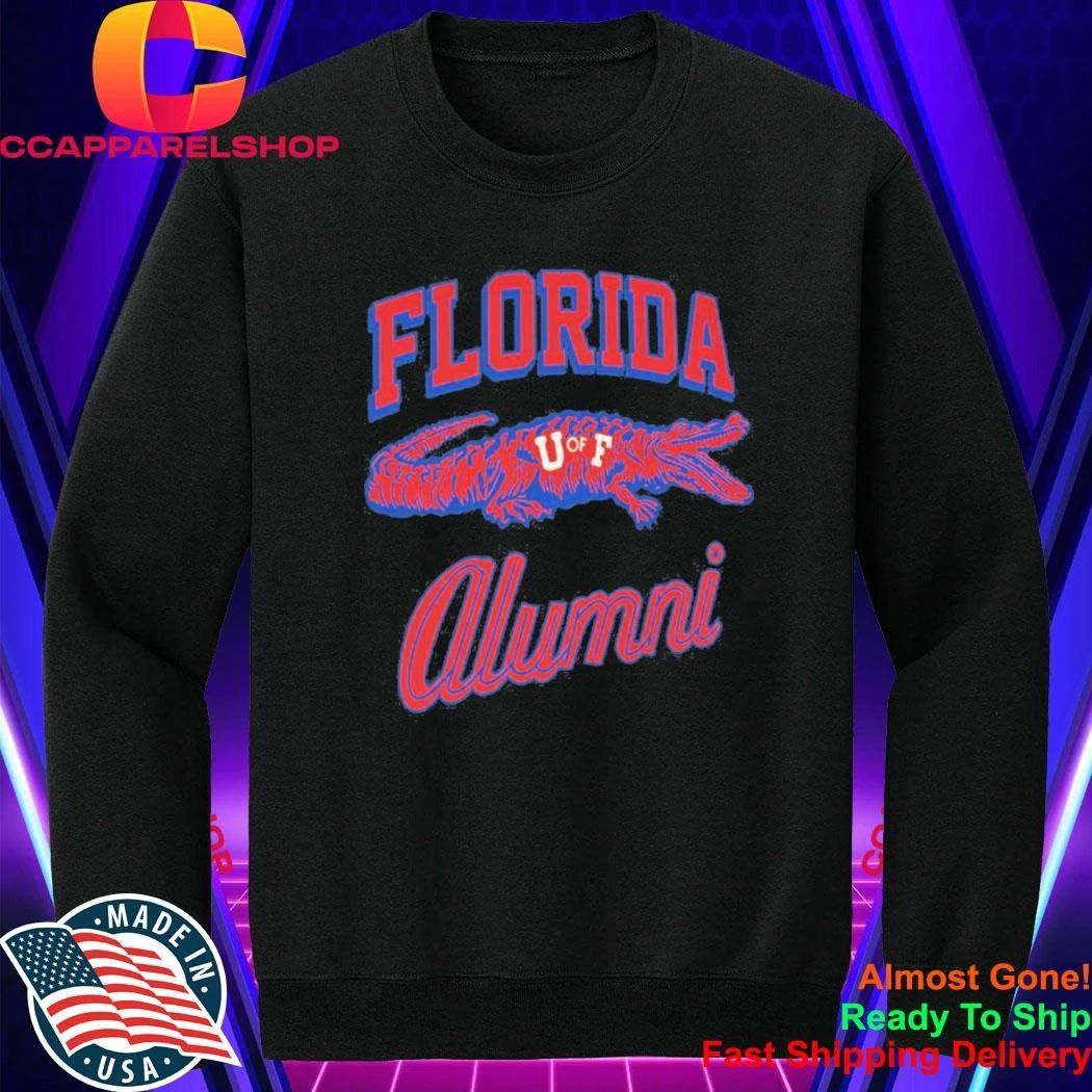 Tim Tebow Wearing University Of Florida Alumni Shirt