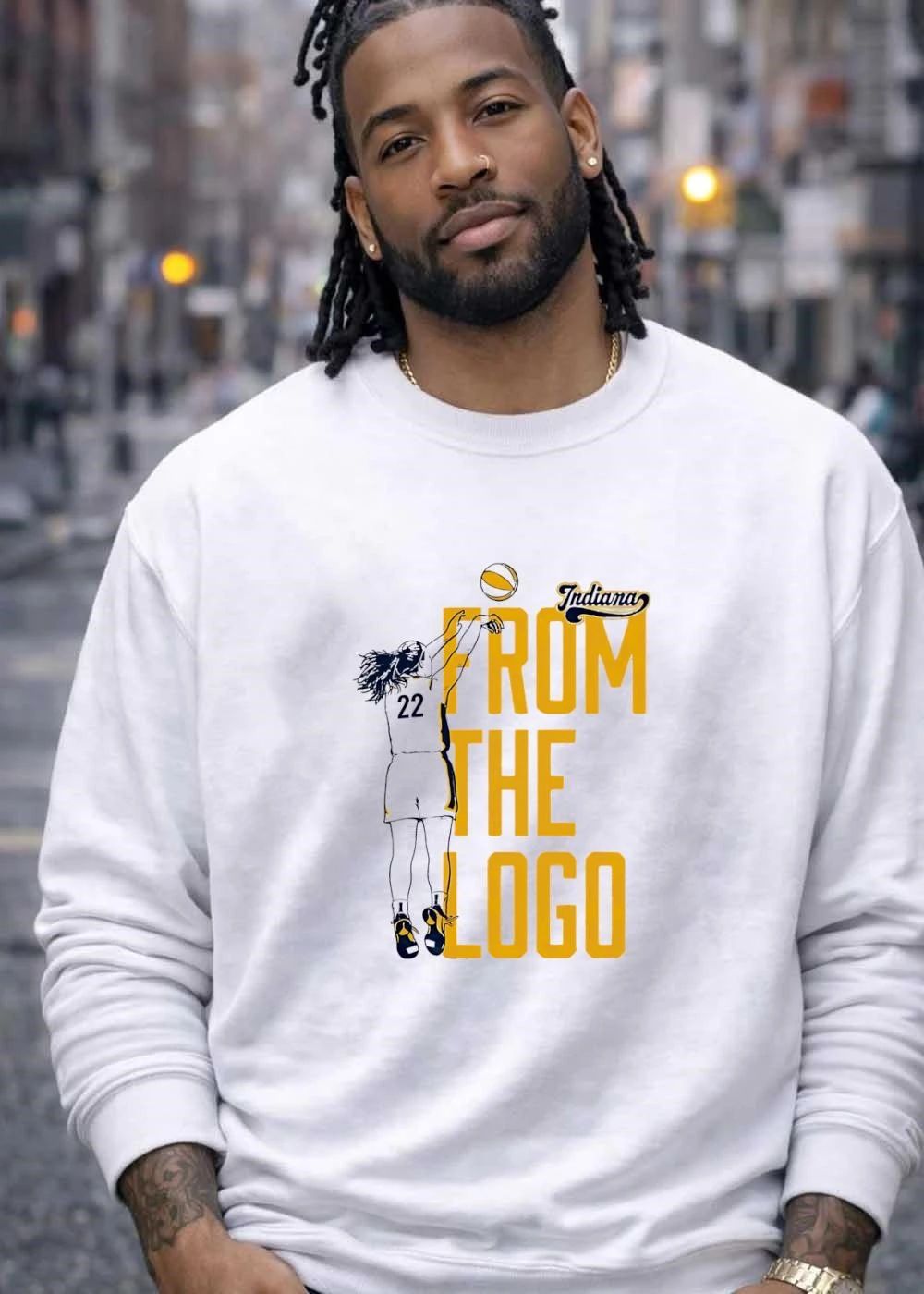 Indiana Basketball Player Jumping for Shot From the Logo Shirt