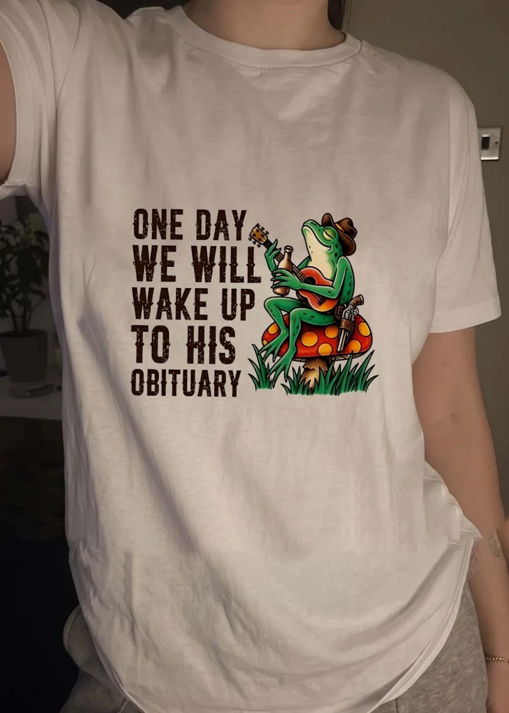 Funny Frog One Day We Will Wake up to His Obituary Cowboy Guitar T-Shirt