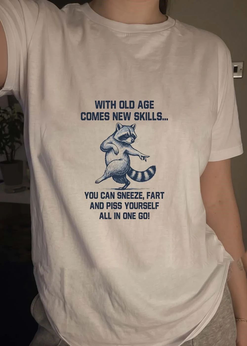 Funny Raccoon Apparel With Old Age Comes New Skills Sneeze Fart Piss T-Shirt