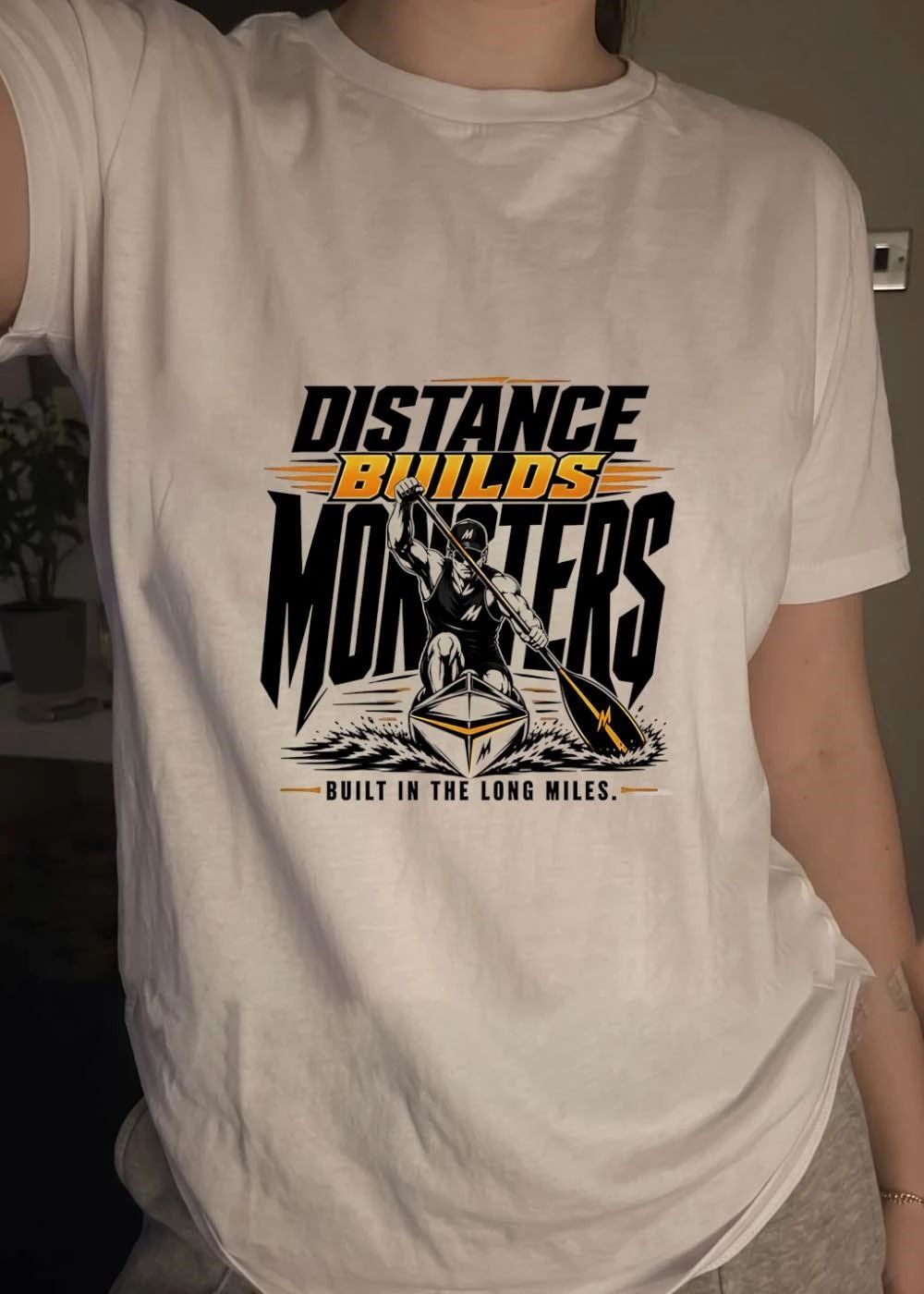 Distance Builds Monsters Paddling Kayaking Athlete M-Logo Built in the Long Miles 2026 Race Prep Shirt