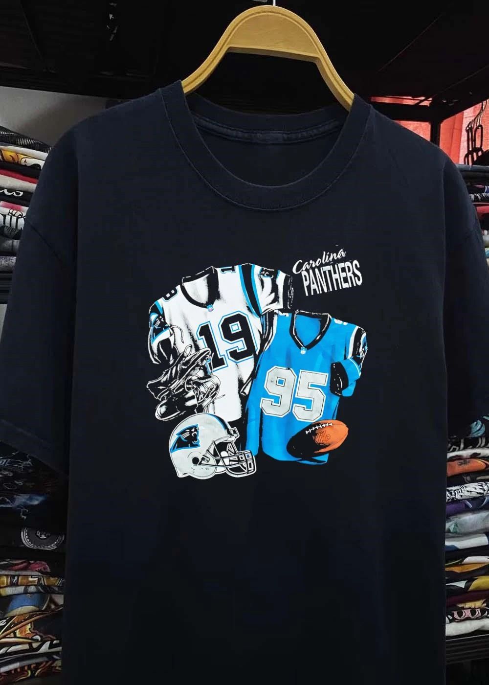 Nutmeg Carolina Panthers Featuring Numbered Jerseys and Helmet Shirt