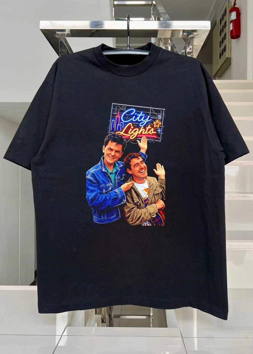 Two Men Smiling and Waving City Lights Shirt