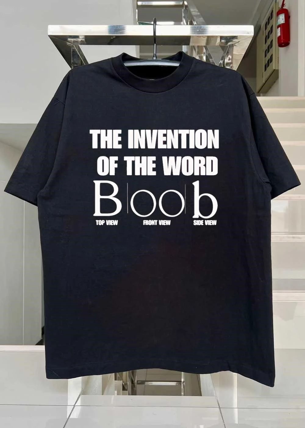The Invention of the Word Boob Top Front Side View Graphic T-Shirt
