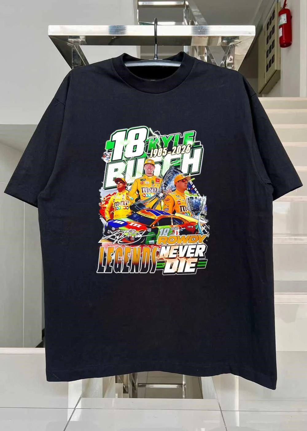 Kyle Busch #18 Rowdy M&M’s Legends Never Die 1985-2026 NASCAR Tribute Shirt