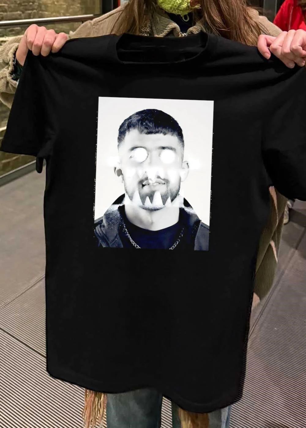 Portrait of Young Man with Glowing Eyes and Teeth Graphic T-Shirt