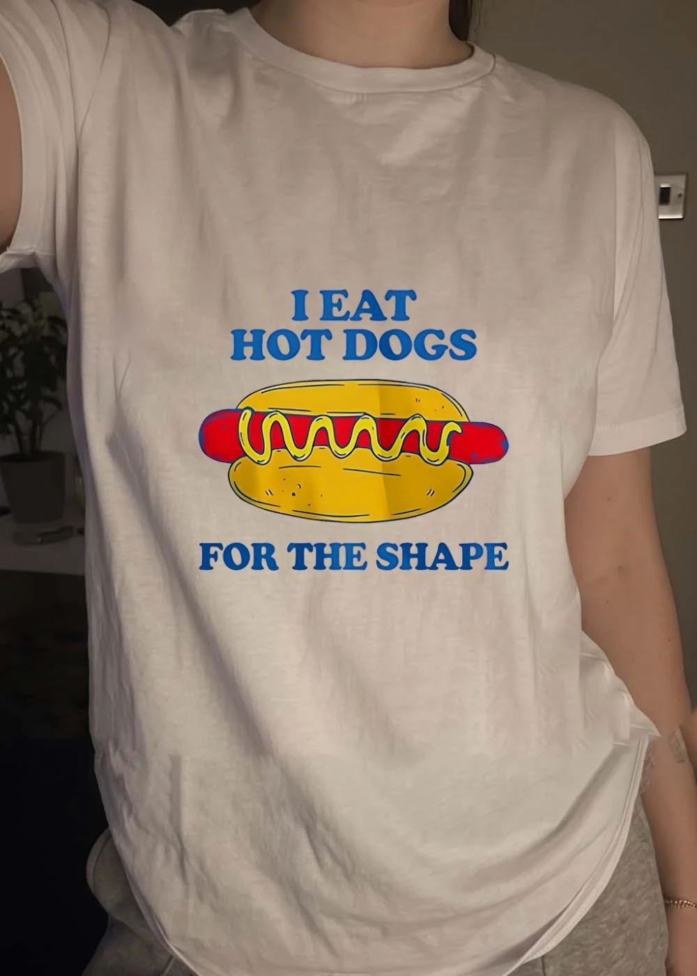 I eat hot dogs for the shape shirt