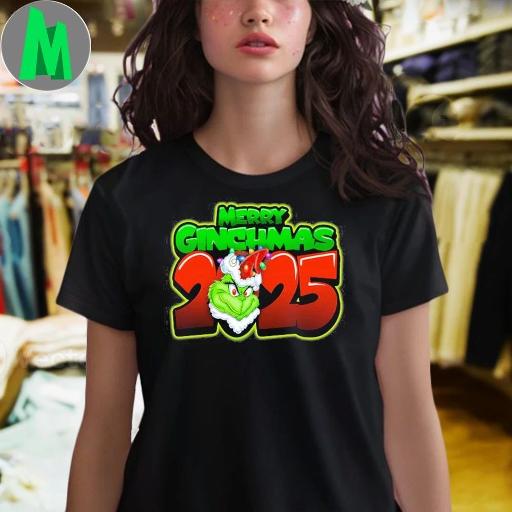 Merry Grinchmas 2025 The Grinch is wearing a Santa hat and Christmas lights Shirt