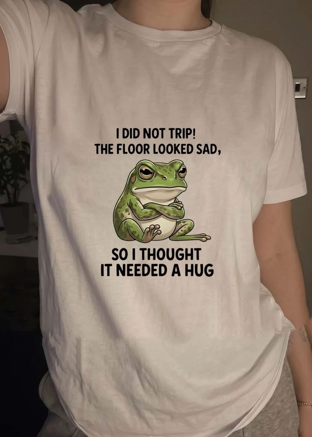 I did not trip the floor looked sad so I thought it needed a hug frog shirt