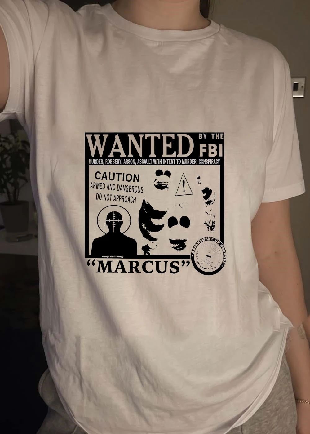 Wanted By The Iba Marcus shirt