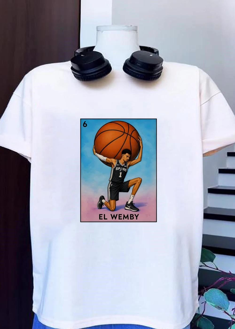 Lotería Style Victor Wembanyama Atlas Holding Basketball El Wemby Spurs T-Shirt
