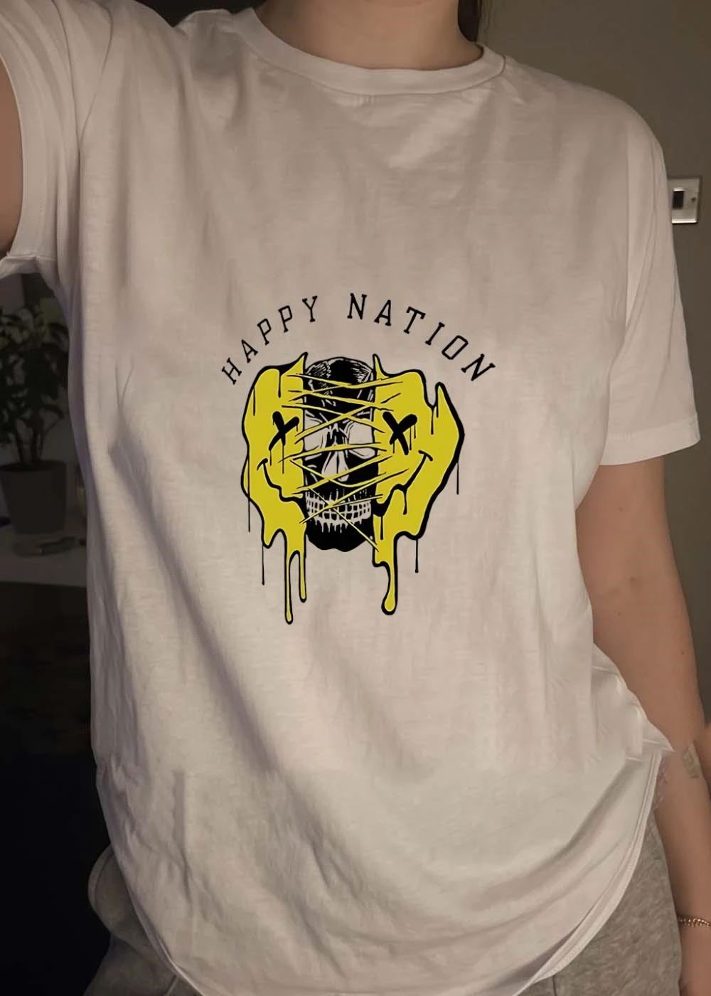 Skull melting smiley face Happy Nation shirt